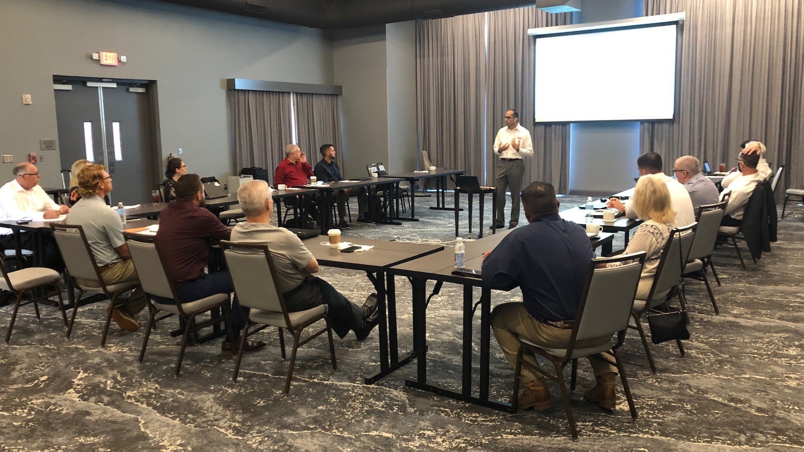 AMTS leadership team meeting in August 2020 discussing high-tech construction project delivery during COVID-19 environment by AMTS in houston, texas. 