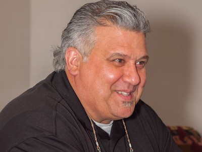 Former NFL player Rich Garza serves as the chaplain of AM Technical Solutions (AM)