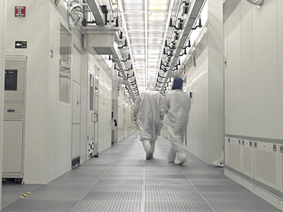 Cleanroom doors and walls in a manufacturing facility