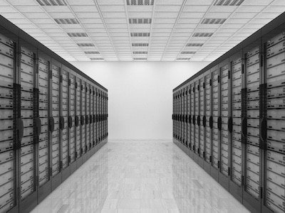 Interior walls, ceilings, and flooring of a data center corridor