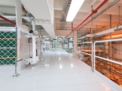 Ceiling and elevated walkway in a semiconductor facility
