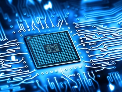 Close-up view of an integrated microchip produced in a semiconductor manufacturing facility