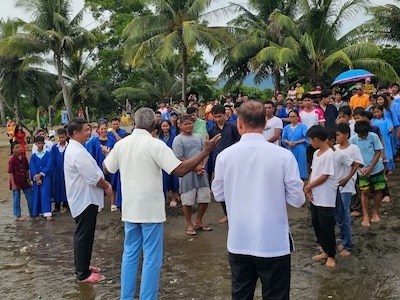 Community gathered in the Philippines to hear preaching on the beach